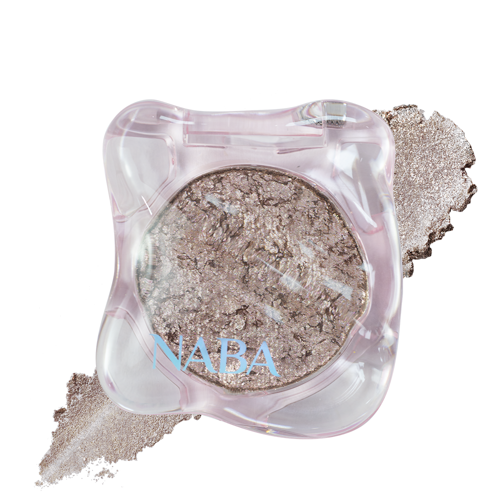 Creamy Pigment Seafoam Glow by NABA Cosmetics USA, vibrant seafoam green eyeshadow swatch on skin.