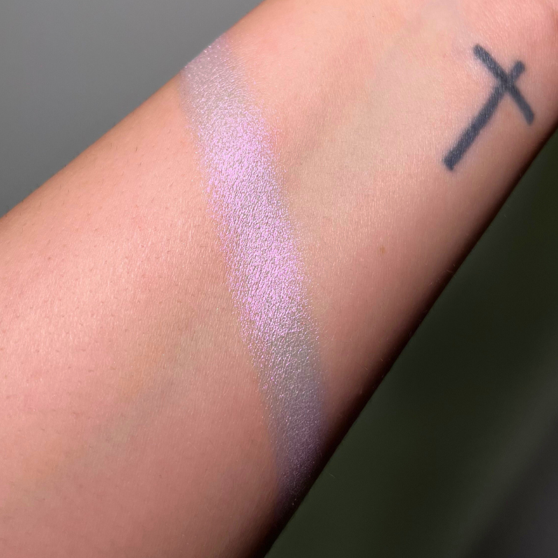Creamy Pigment Tulip by NABA Cosmetics USA, vibrant orange-red cream eyeshadow in a sleek container.