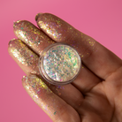 NABA Cosmetics USA Flake Ninfa eyeshadow with shimmering pink and gold tones, close-up of the colorful makeup product.