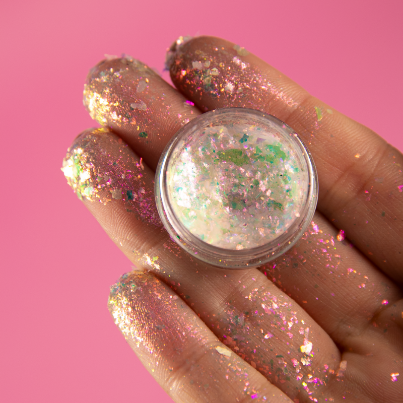 NABA Cosmetics USA Flake Pluton beauty product with flaky, shimmering texture in a sleek container.