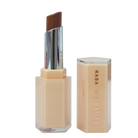 Glass lipstick container with a deep red shade labeled Negroni by NABA Cosmetics USA.
