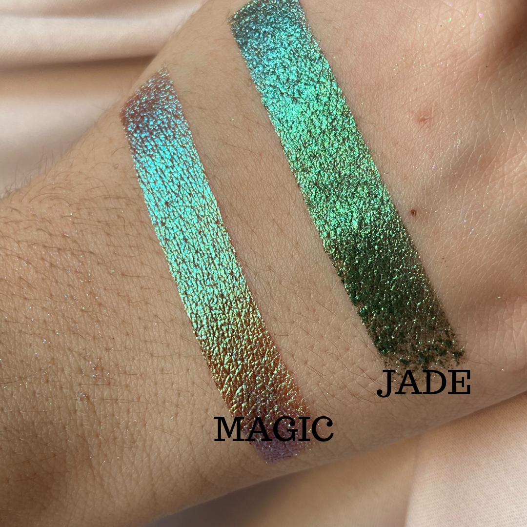 Vibrant Magic Pigment from NABA Cosmetics USA showcasing a shimmering, colorful cosmetic pigment in a small jar.