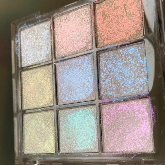 NABA Cosmetics USA Pigment Palette Orbit with vibrant, colorful eyeshadows arranged in a sleek palette for eye makeup.