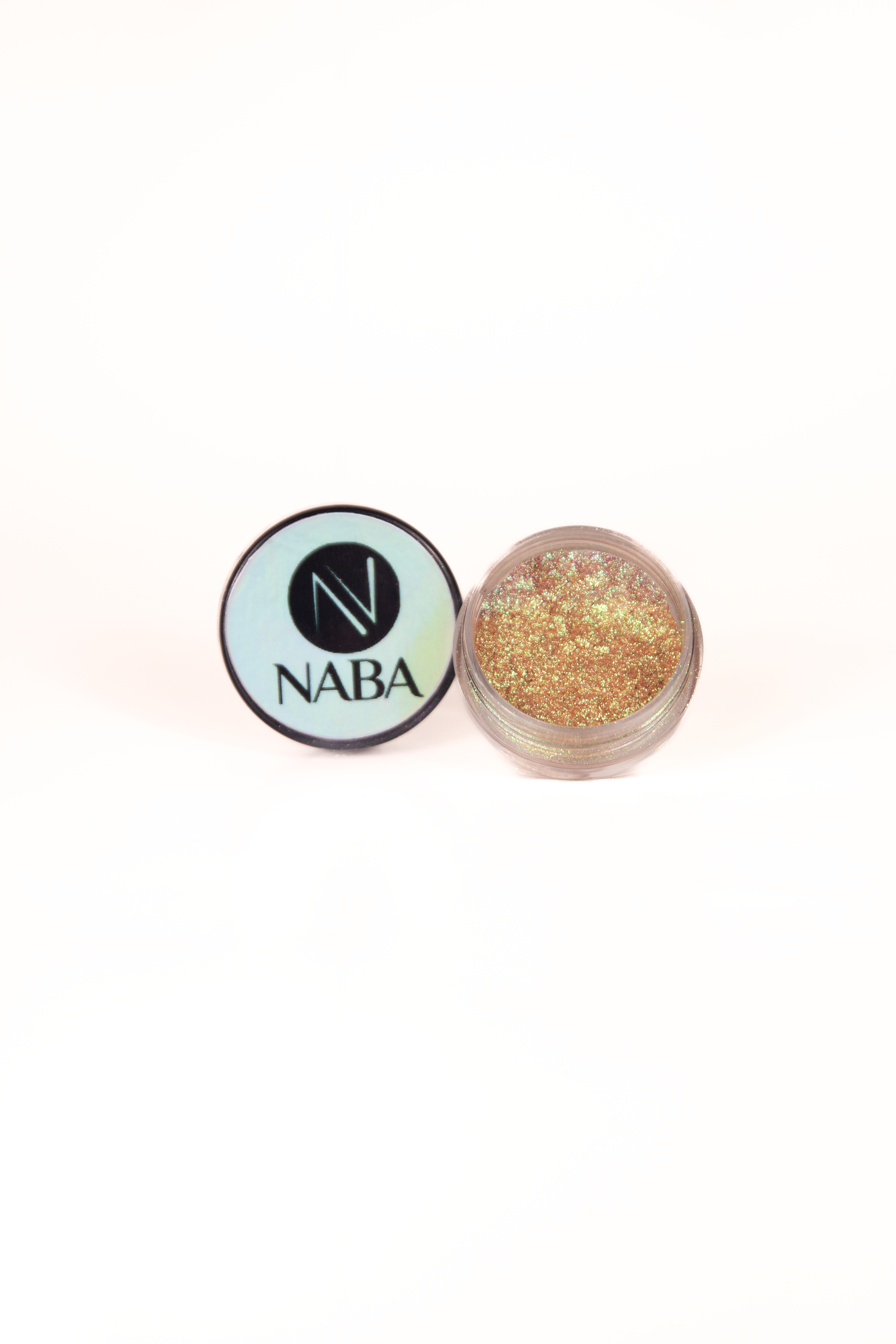 NABA Cosmetics USA Pocky Pigment in a vibrant, shimmery eyeshadow container with a clear lid showing the colorful pigment inside.