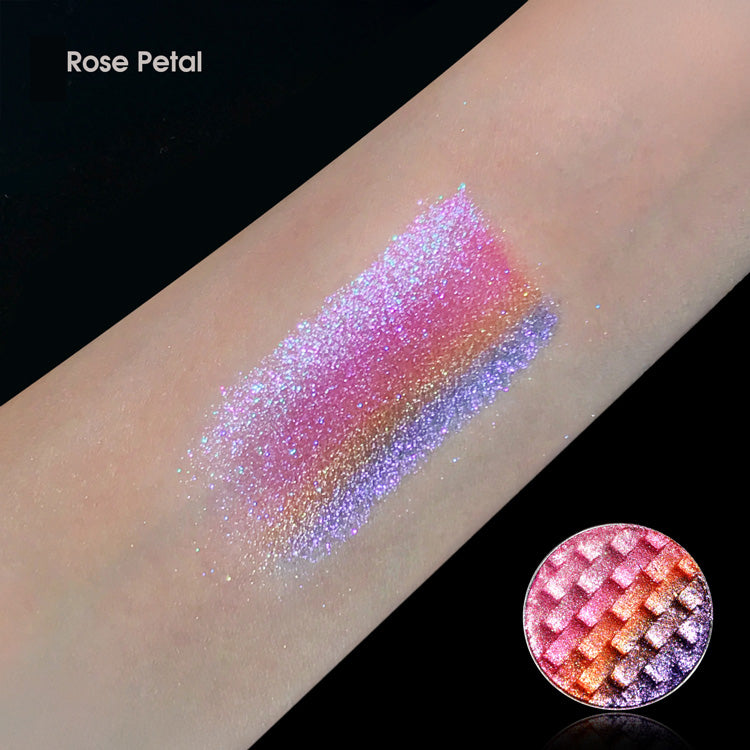 Rainbow Creamy Pigment in Rose Petal by NABA Cosmetics USA, vibrant pink and purple eyeshadow swatches on a hand.