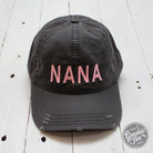 Charcoal distressed canvas cap by The Graphic Tee featuring a casual, worn-in style and adjustable strap.