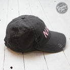 Charcoal distressed canvas cap by The Graphic Tee featuring a casual, worn-in look and a curved brim.