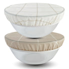 Reusable beeswax bowl covers by Nectar & Nest, 10-inch size, designed for bread proofing and food storage, with natural beeswax texture.