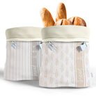 Reusable beeswax bread bags for homemade bread and sourdough by Nectar & Nest, showing natural beeswax-coated fabric and bread inside.