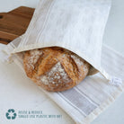 Reusable beeswax bread bags from Nectar & Nest for homemade bread and sourdough storage, eco-friendly and breathable.