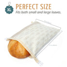 Reusable beeswax bread bags from Nectar & Nest, showcasing homemade bread and sourdough inside the natural, eco-friendly packaging.