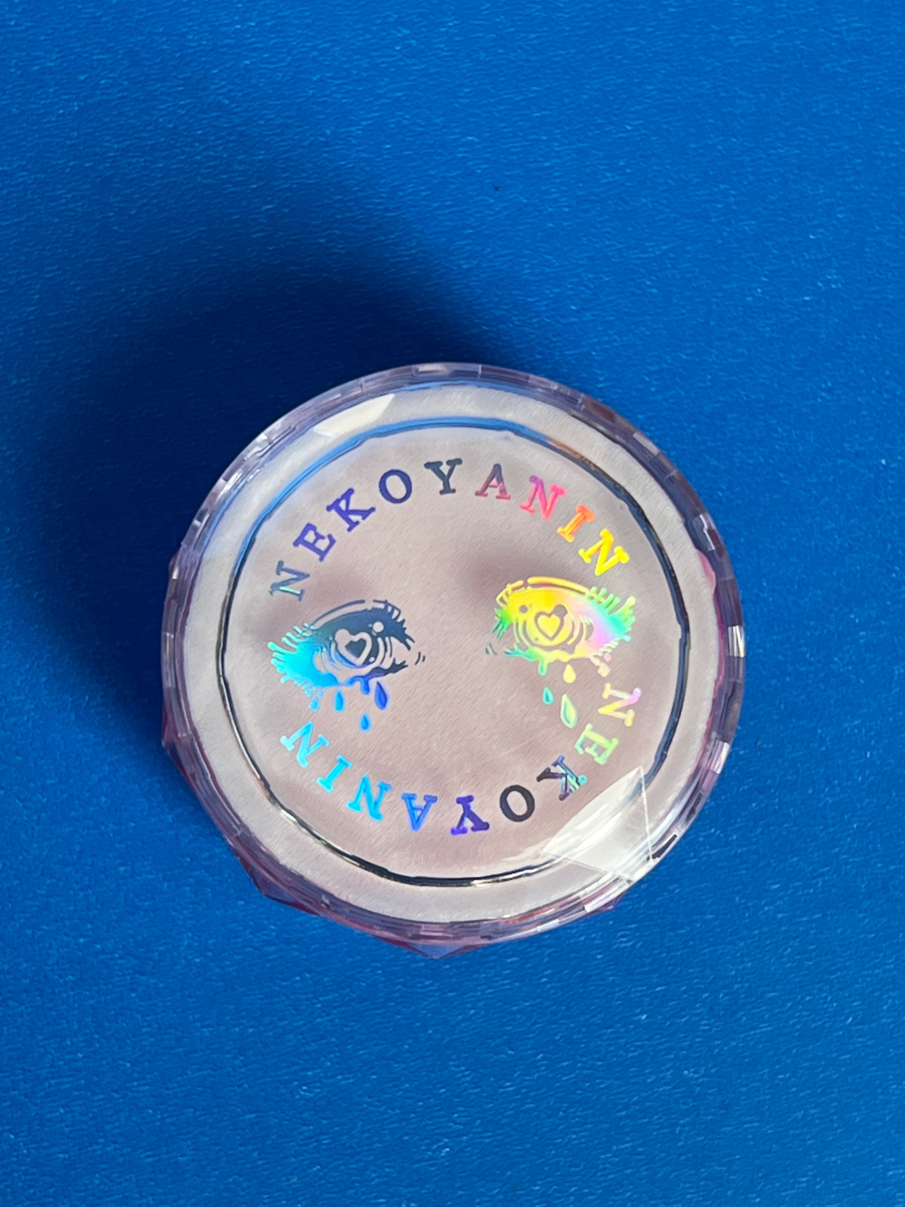 Nekoyanin Gel Glitter Tears in a jar, sparkling silver glitter with a gel consistency, suitable for nail art and creative designs.