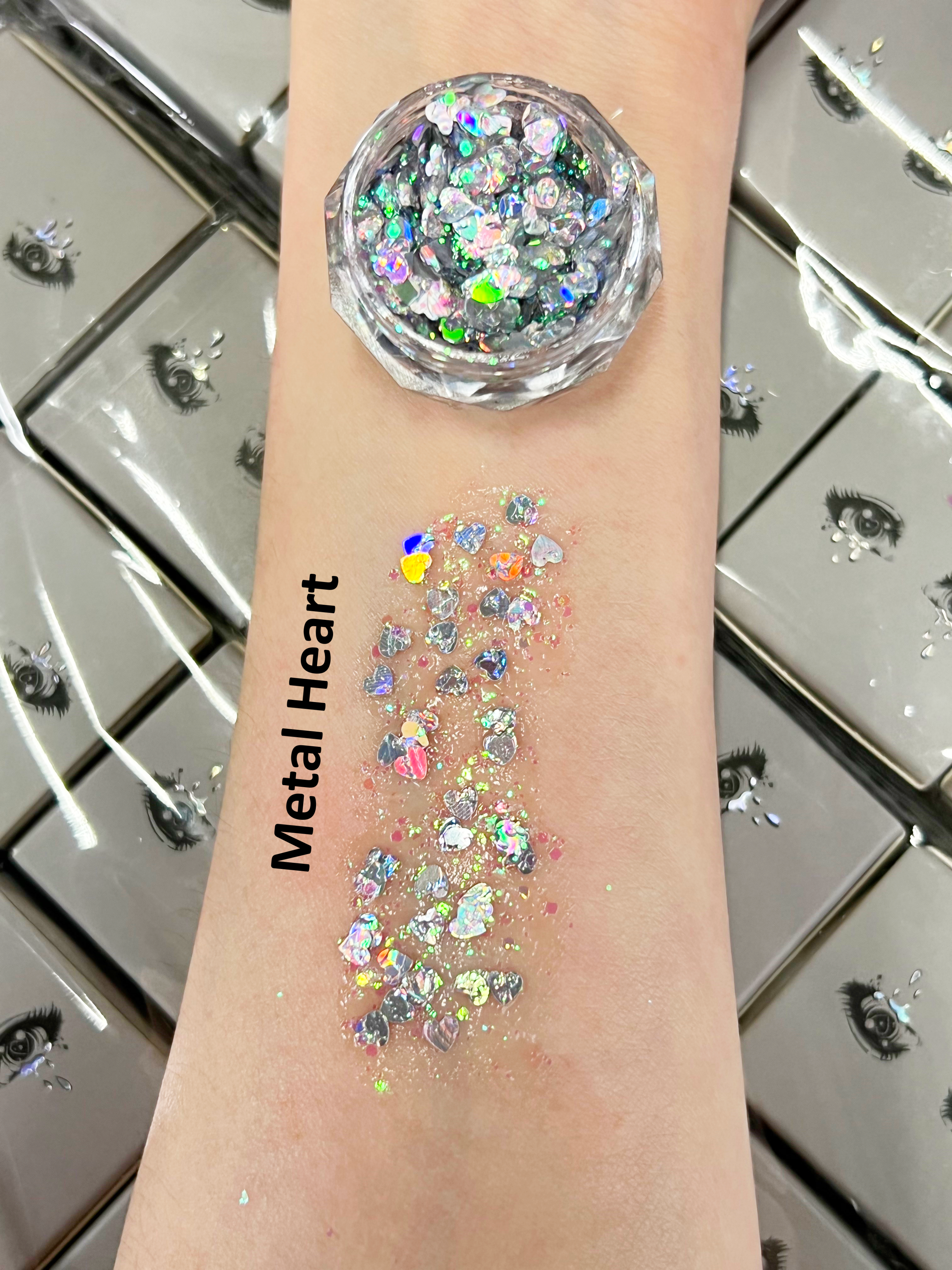 Nekoyanin Gel Glitter Tears in shimmering gold, showcasing the sparkly, gel-based product with a glossy, tear-like texture.