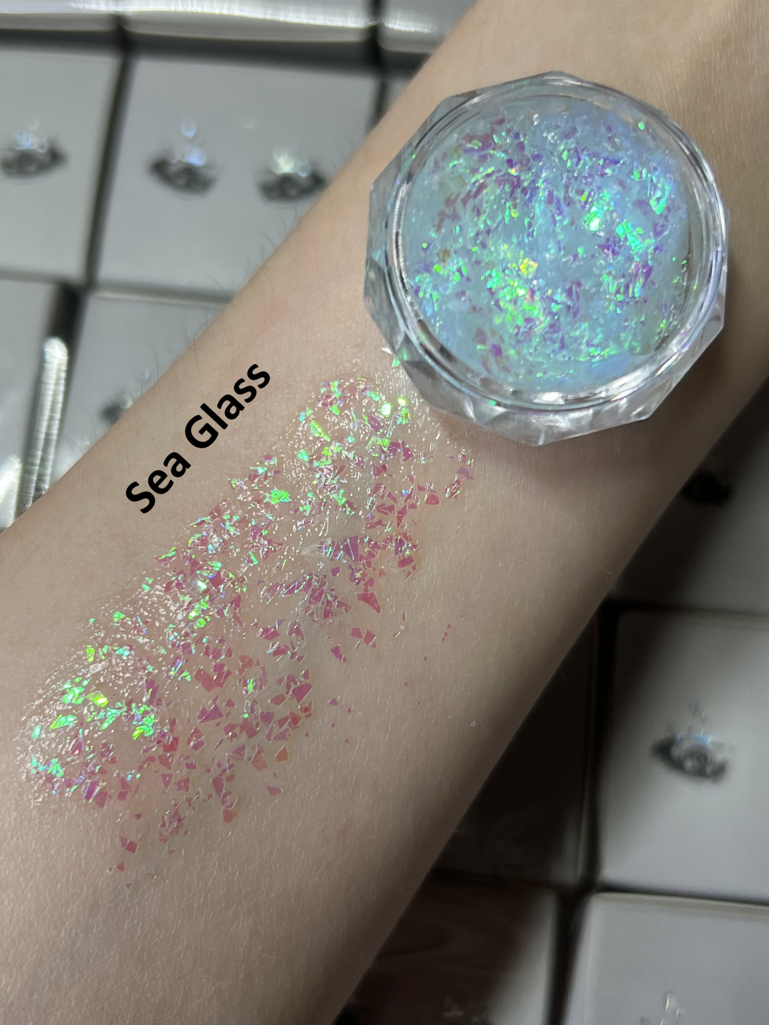 Nekoyanin Gel Glitter Tears in a small jar with shimmering silver glitter, perfect for nail art and cosmetic decoration.