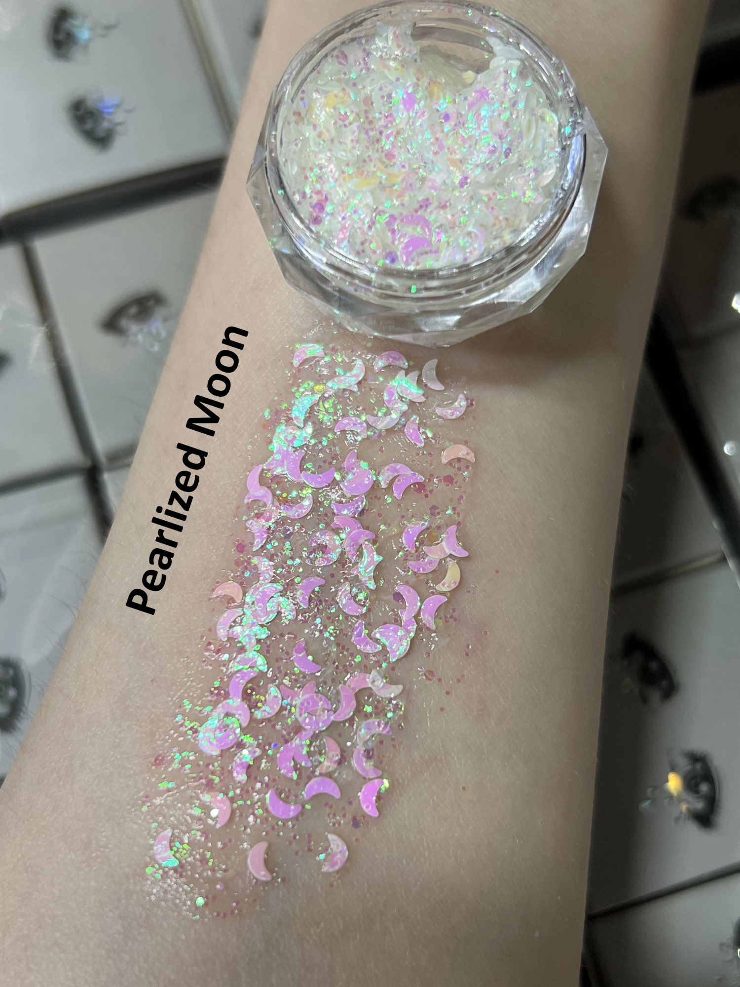 Nekoyanin Gel Glitter Tears in a clear container with shimmering, colorful glitter gel for creative nail art and decoration.