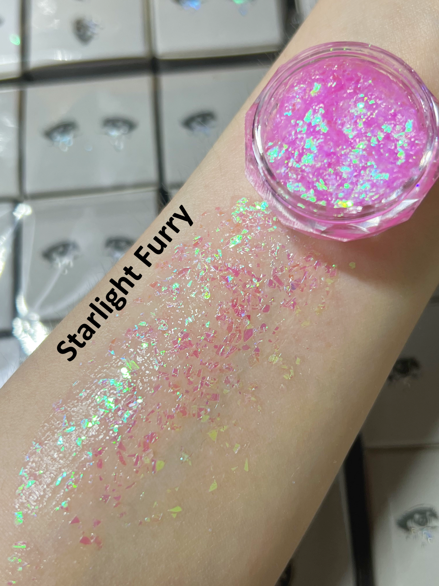 Nekoyanin Gel Glitter Tears in a jar with shimmering silver and gold glitter, perfect for eye makeup and special occasions.