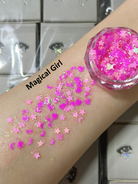 Nekoyanin Gel Glitter Tears in a small jar with sparkling gold glitter, showcasing its shiny, tear-like gel texture for creative makeup or art.
