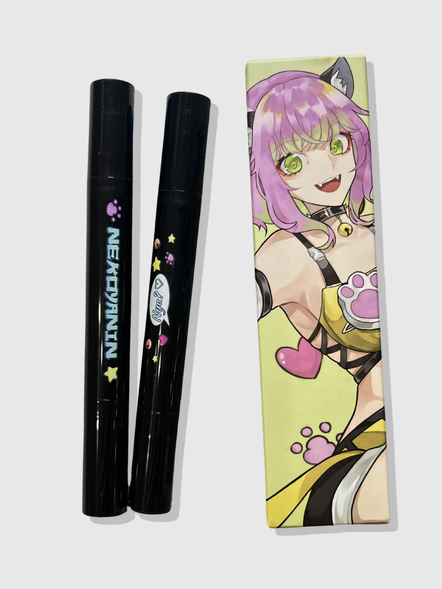 Black cat girl winged eyeliner stamp and eraser by Nekoyanin, featuring a cute cat-themed design for precise makeup application.
