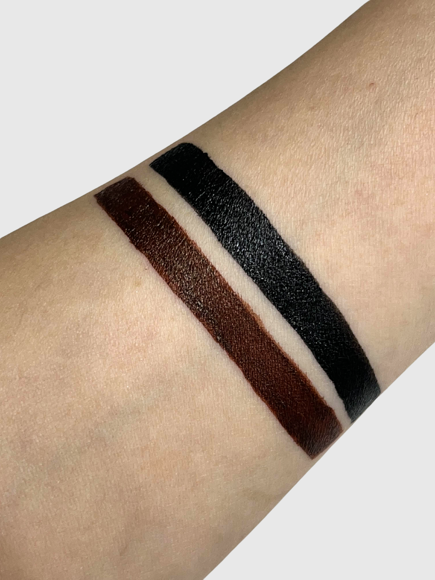 Black cat girl winged eyeliner stamp and eraser by Nekoyanin, featuring a cute cat-themed design for precise eyeliner application.