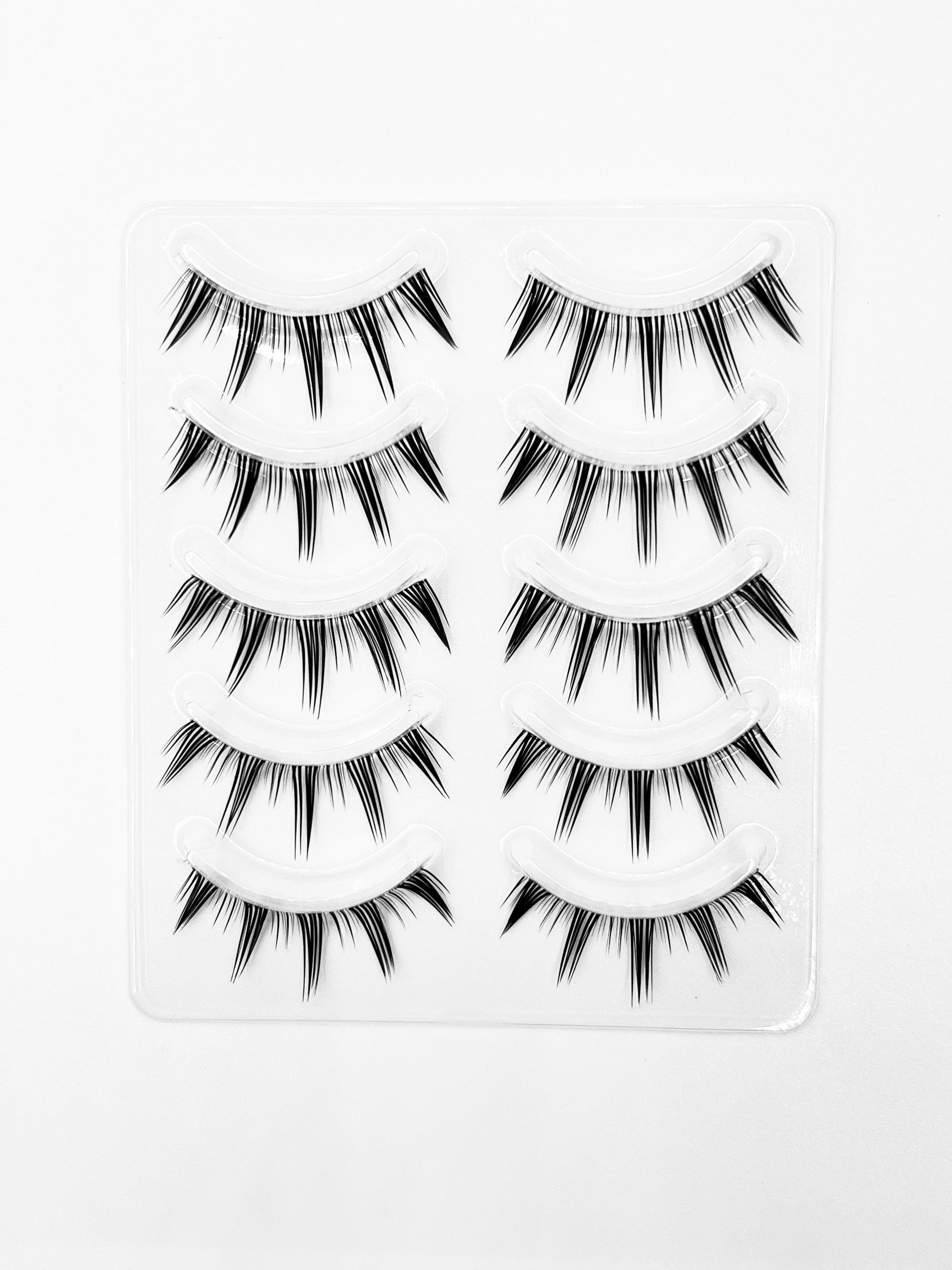 Nekoyanin Zodiac Manga Lashes featuring Cancer symbol, long black false eyelashes with intricate manga-inspired design.