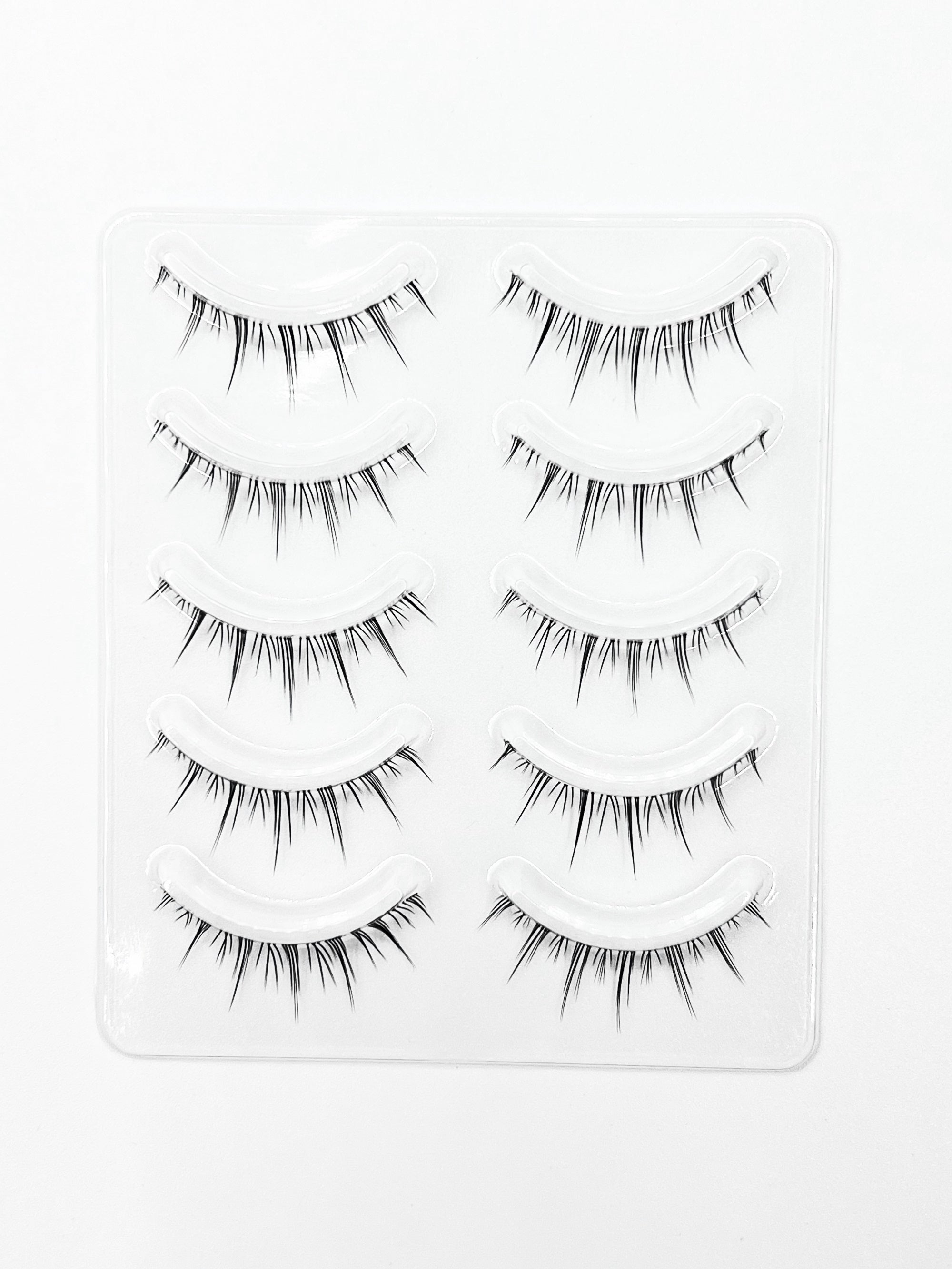 Nekoyanin Zodiac Manga Lashes featuring Cancer zodiac design with long, curved black eyelash extensions.