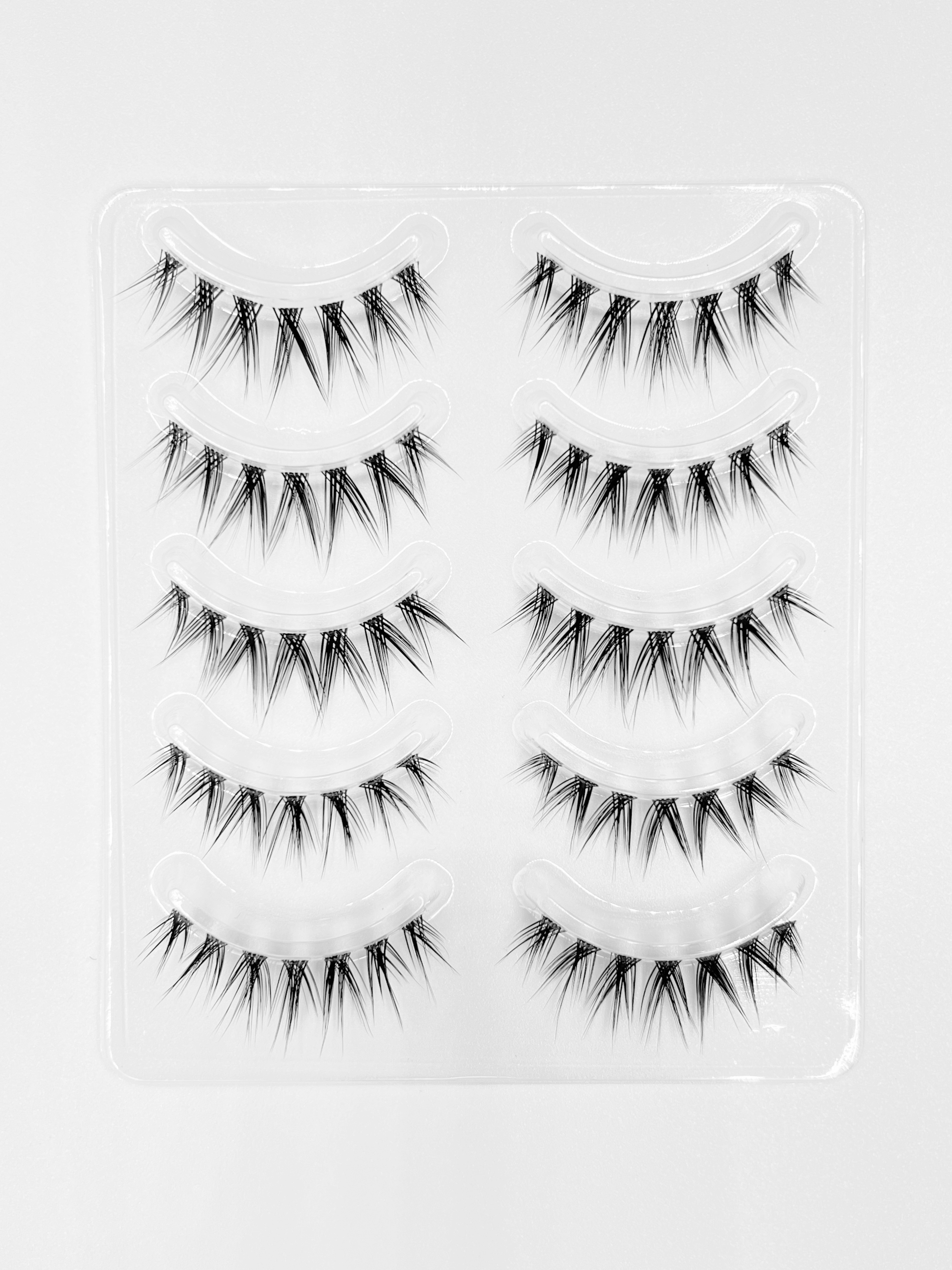 Nekoyanin Zodiac Manga Lashes featuring Cancer zodiac design with long, curled black lashes for a bold, anime-inspired look.