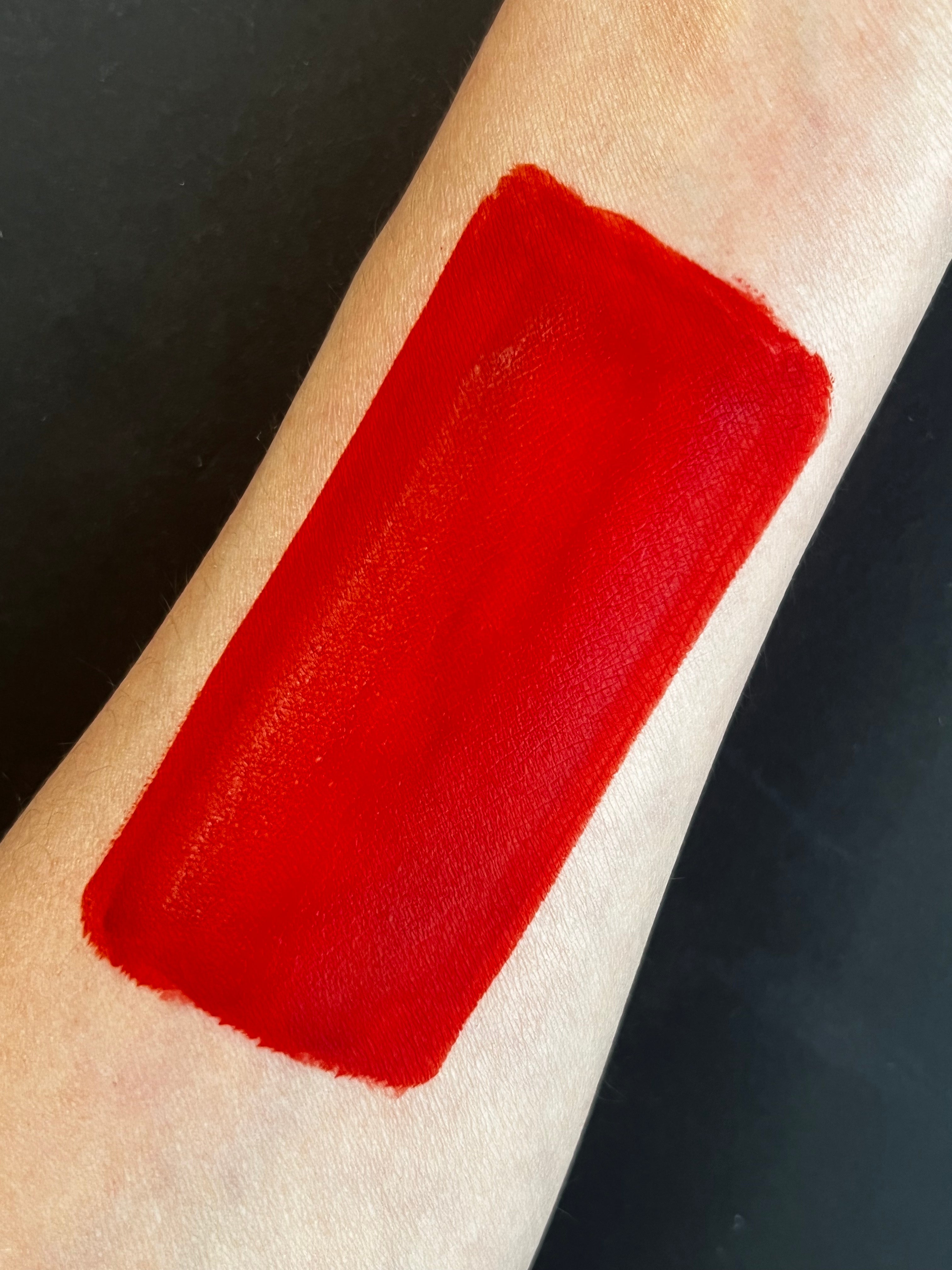 Nekoyanin Cherry Red Water Activated Graphic Liner with bold red ink and artistic design for eye makeup.