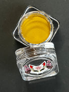 Yellow water-activated graphic eyeliner by Nekoyanin, featuring a vibrant mustard color and artistic design.