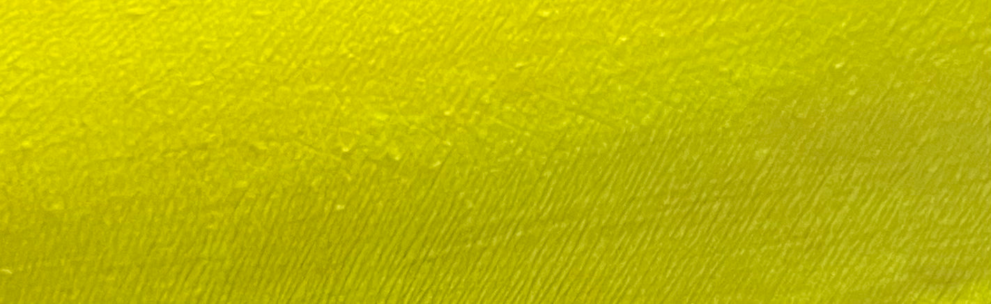 Nekoyanin 15 Dijon yellow water-activated graphic liner displayed with the pen and swatched on paper.