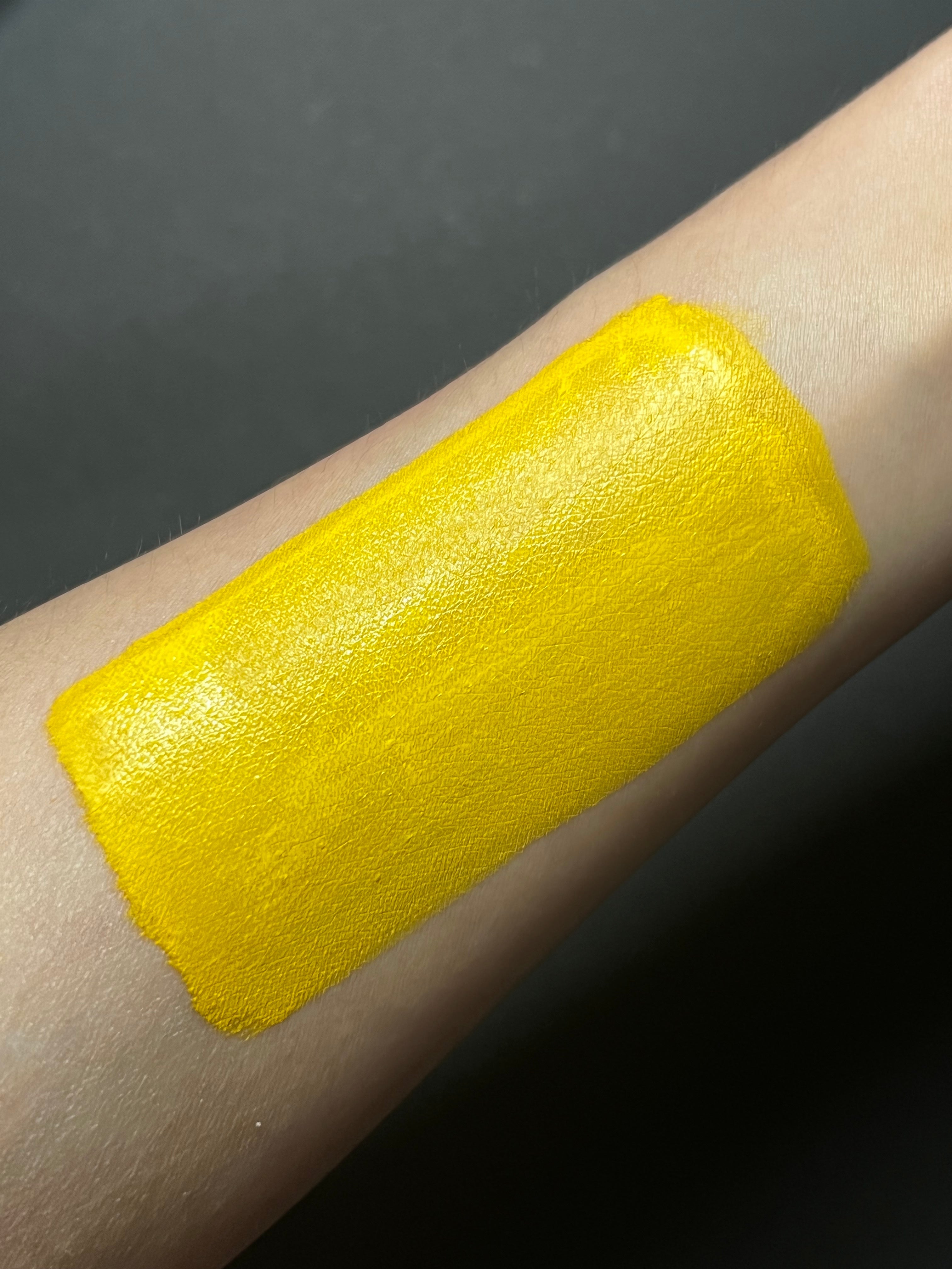 Yellow banana water-activated graphic liner by Nekoyanin, featuring a vibrant, animated design on a sleek eyeliner pen.