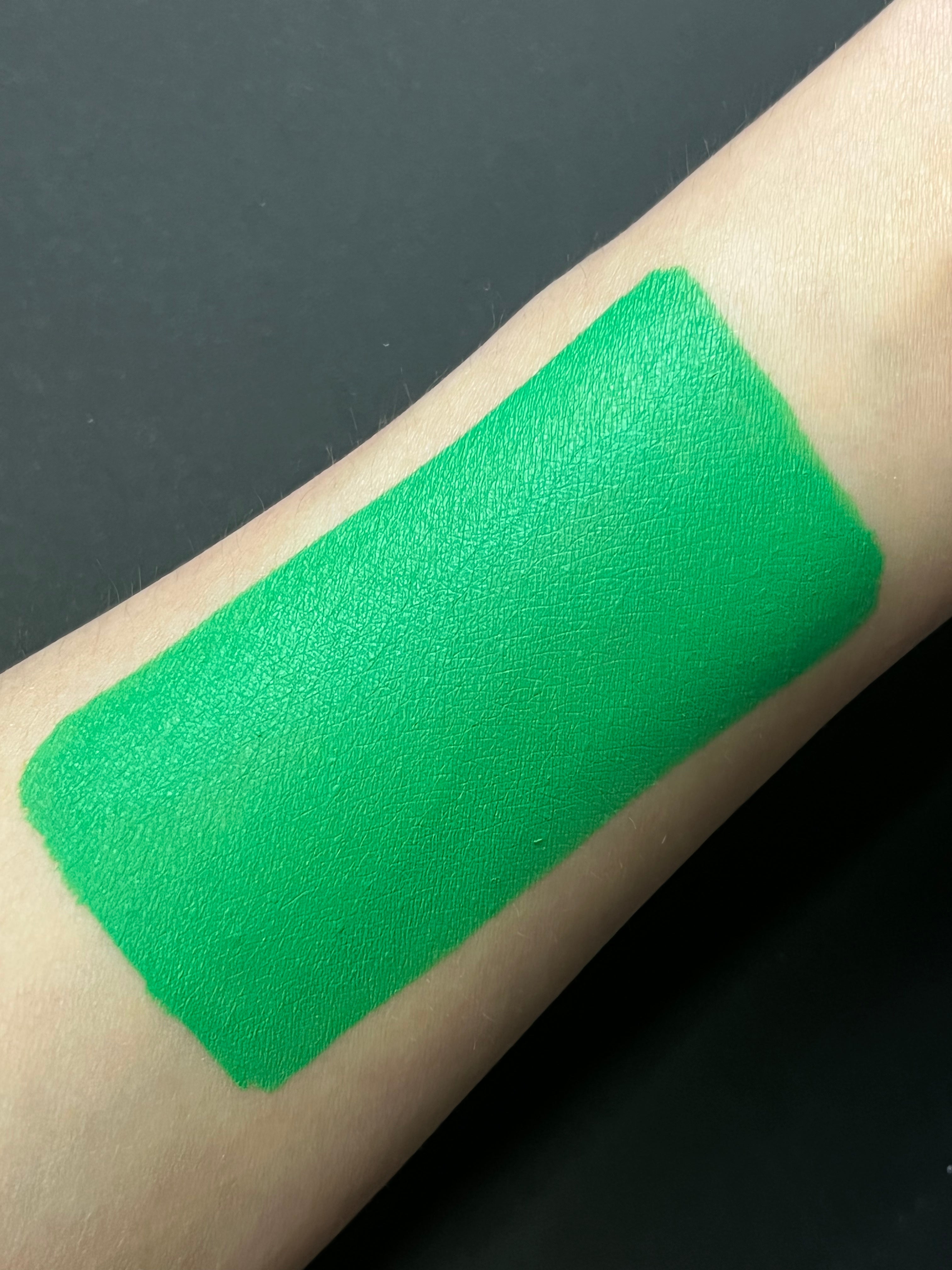 Nekoyanin Emerald water activated graphic eyeliner displayed on a white background, showcasing its vivid green color and design.