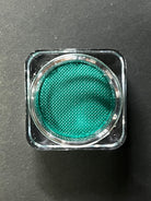 Nekoyanin Aqua Water Activated Graphic Liner in vibrant turquoise, showcasing its water-activated ink and bold design.
