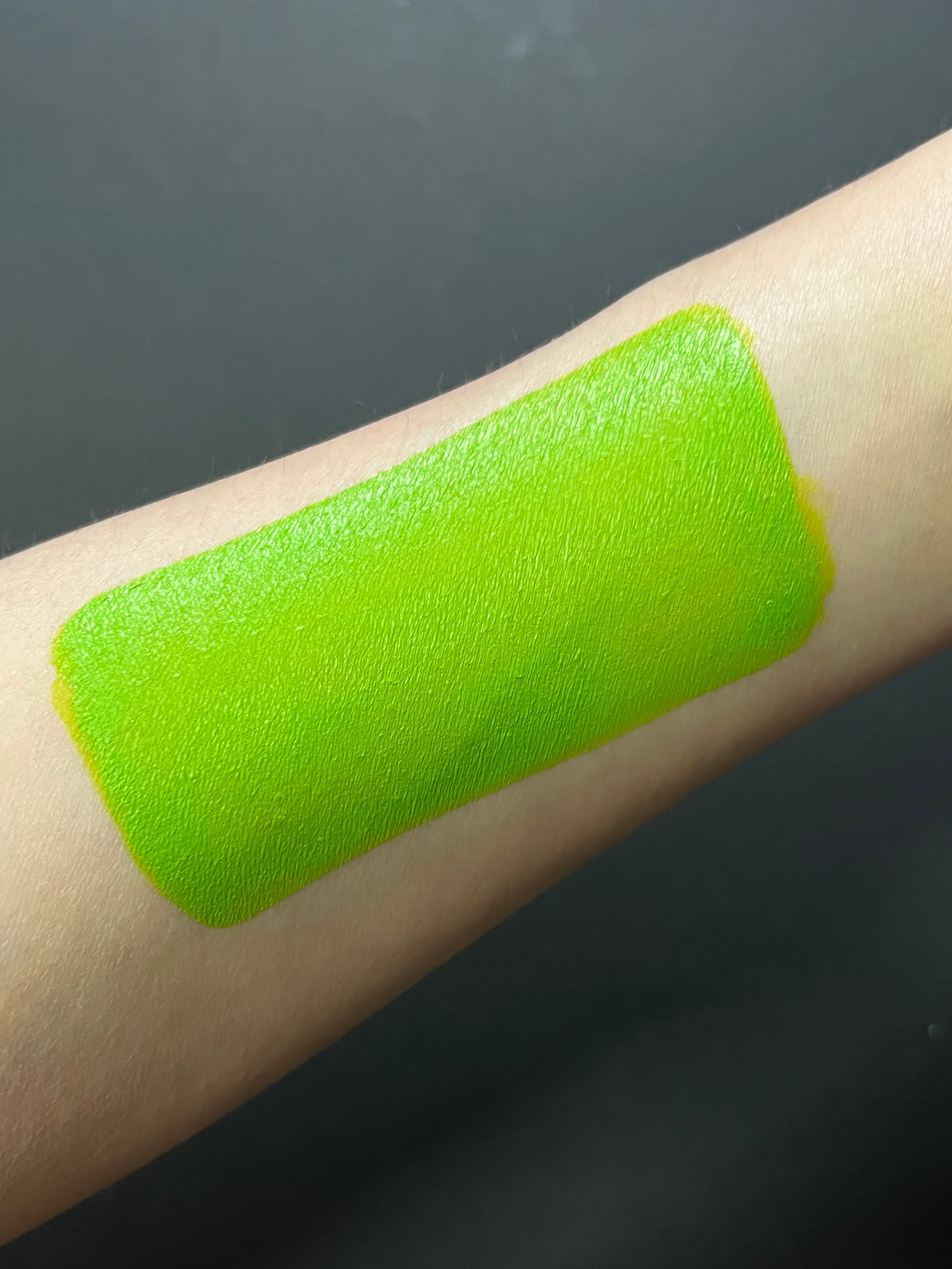 Green Nekoyanin Kelly Water Activated Graphic Liner with bold, artistic design on a black background.