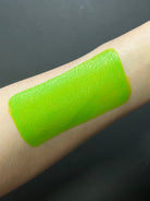 Green Nekoyanin Kelly Water Activated Graphic Liner with bold, artistic design on a black background.