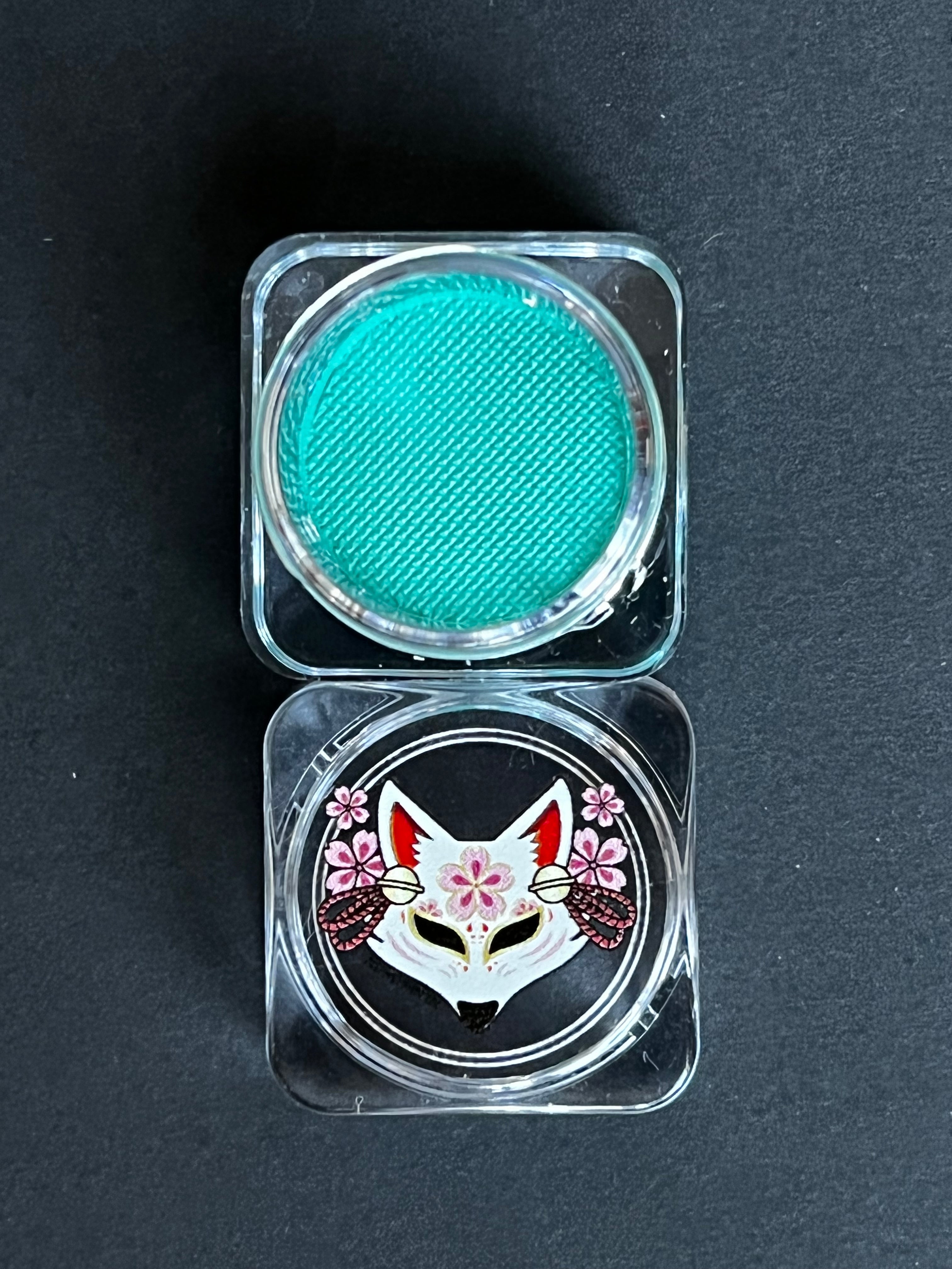 Nekoyanin 23 Cyan Water Activated Graphic Liner with vibrant blue ink, shown with the liner tip visible for detailed application.