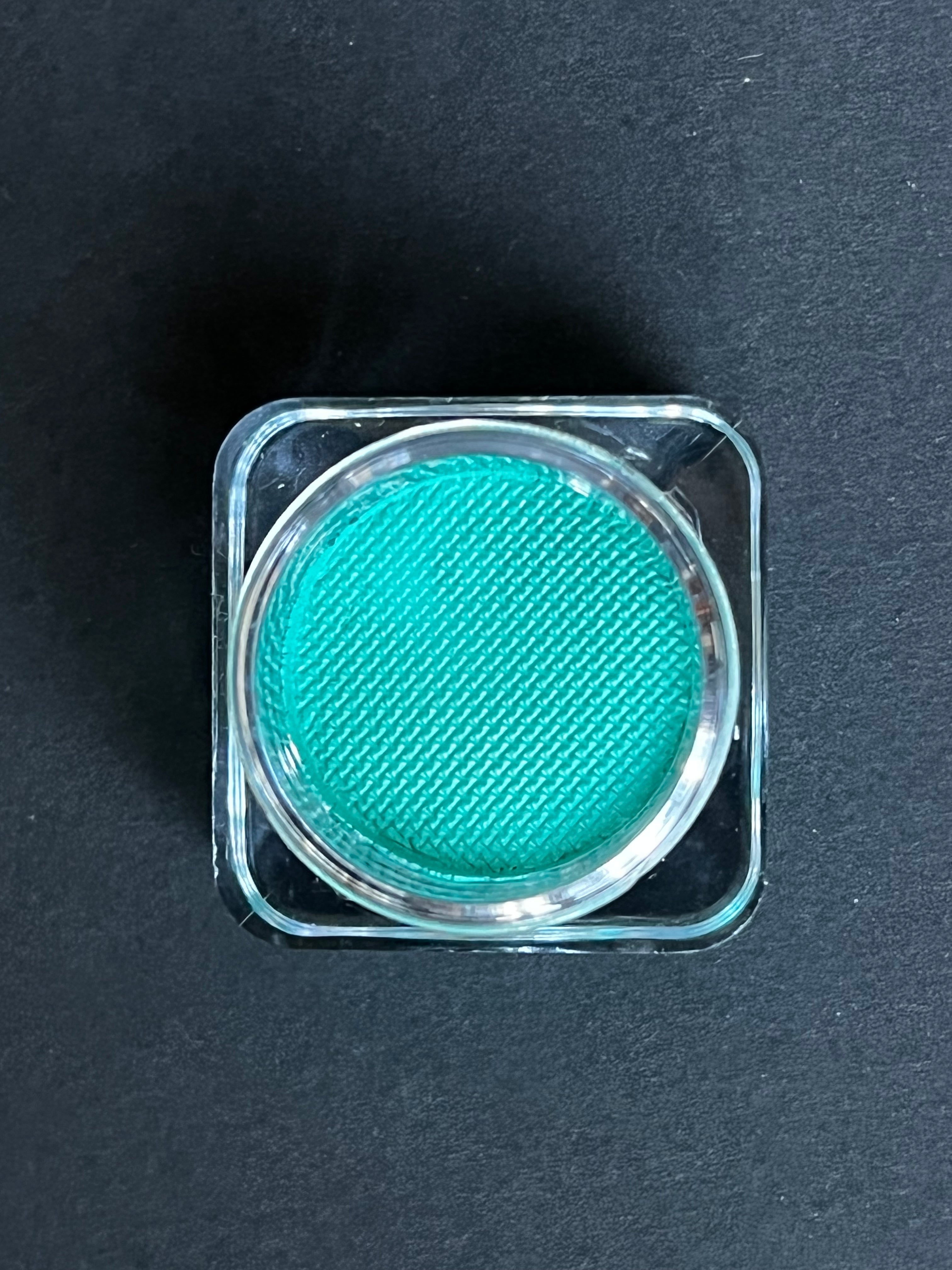 Nekoyanin 23 Cyan Water Activated Graphic Liner showing vibrant blue ink and detailed tip for eye makeup application