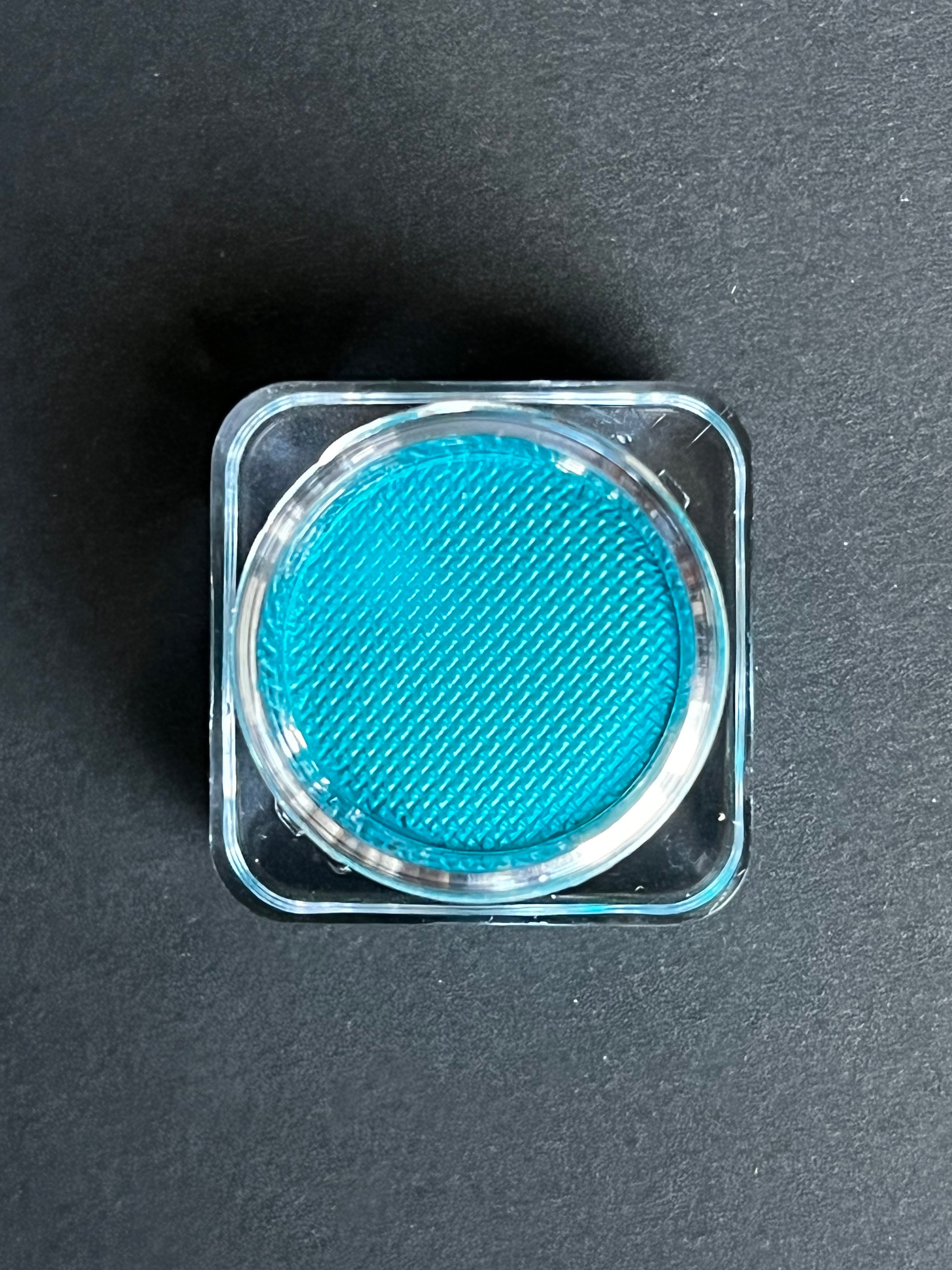 Blue Nekoyanin Electric Water Activated Graphic Liner with vibrant, water-reactive ink for bold eye makeup looks.
