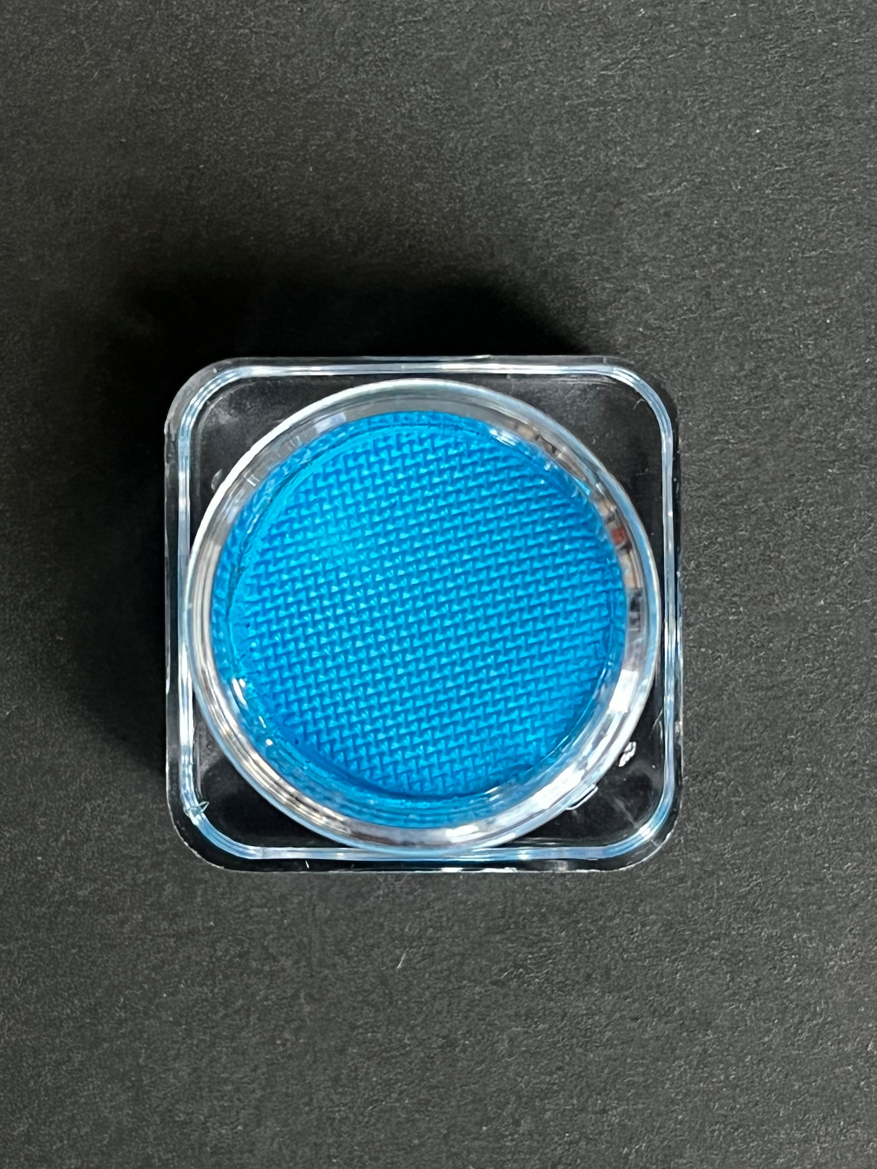 Nekoyanin Cerulean Blue Water Activated Graphic Liner tube with blue ink and applicator brush for bold eye makeup looks