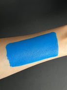 Blue water-activated graphic eyeliner by Nekoyanin, showcasing vibrant cobalt color and detailed design.