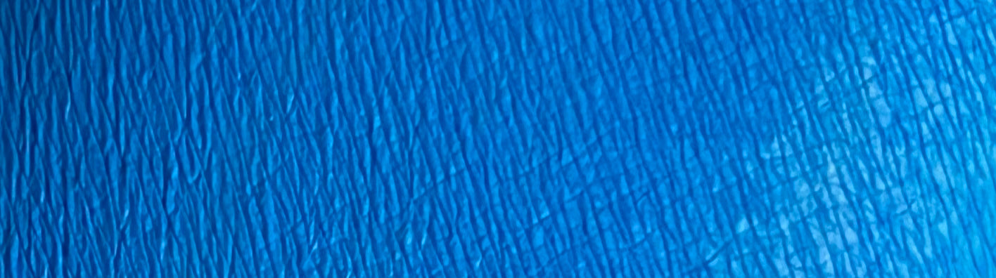 Nekoyanin cobalt blue water-activated graphic liner displayed on a makeup model, showcasing vibrant, artistic eye makeup.