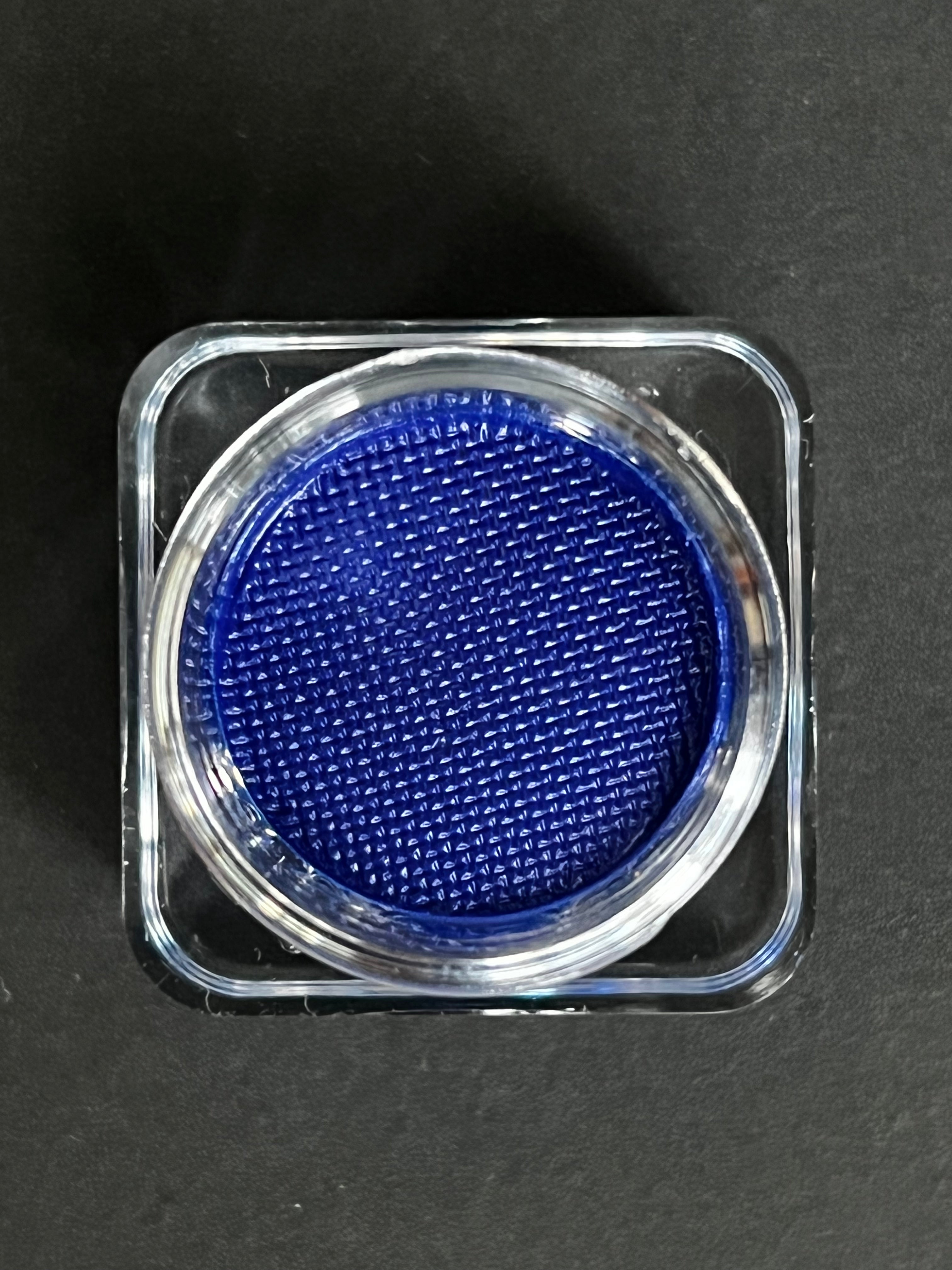 Blue water-activated graphic eyeliner by Nekoyanin, showcasing vibrant Azure color with intricate design for eye makeup art.