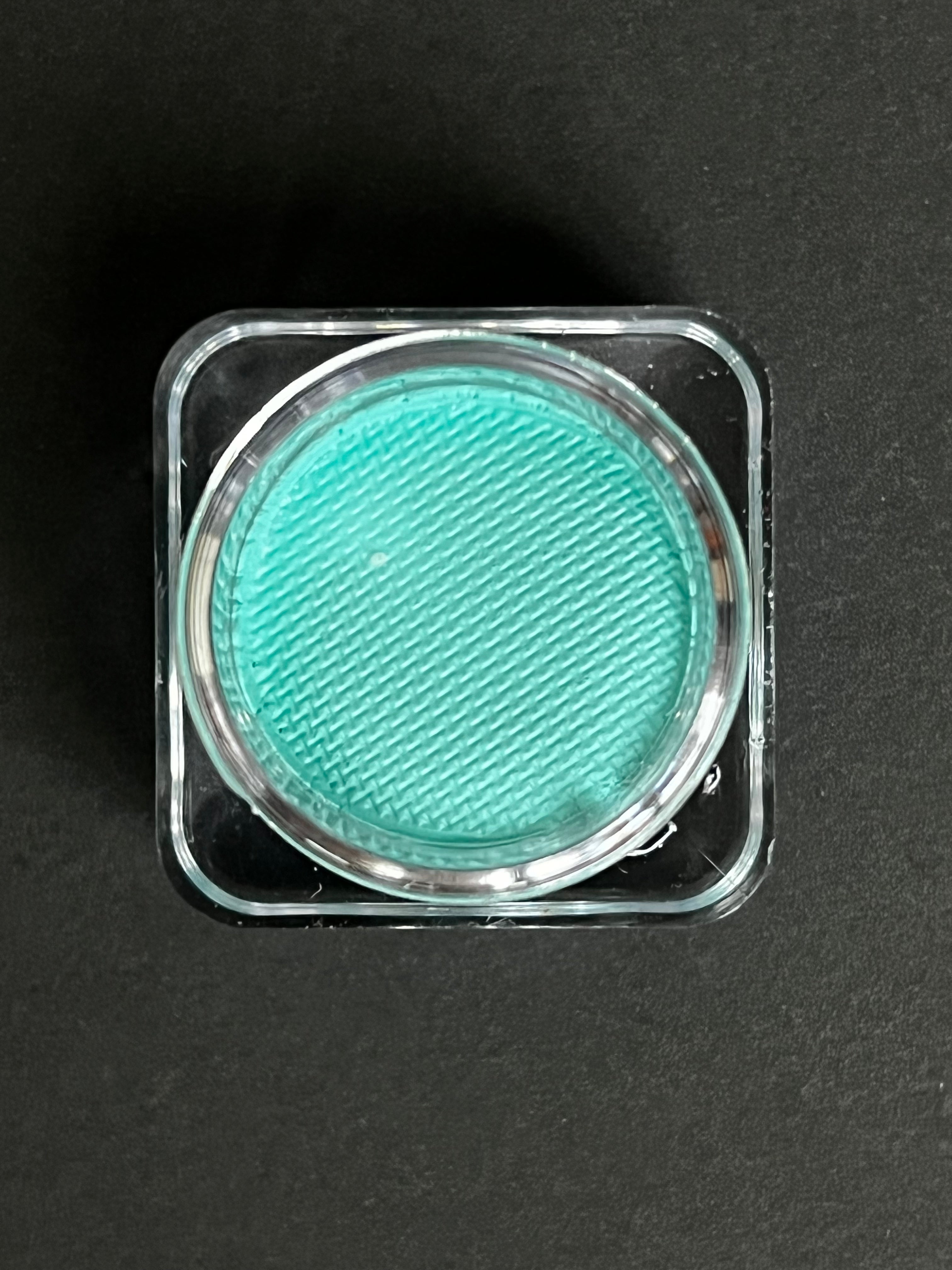 Blue Arctic Water Activated Graphic Liner by Nekoyanin, displaying the vibrant, water-activated design on a sleek eyeliner pen.