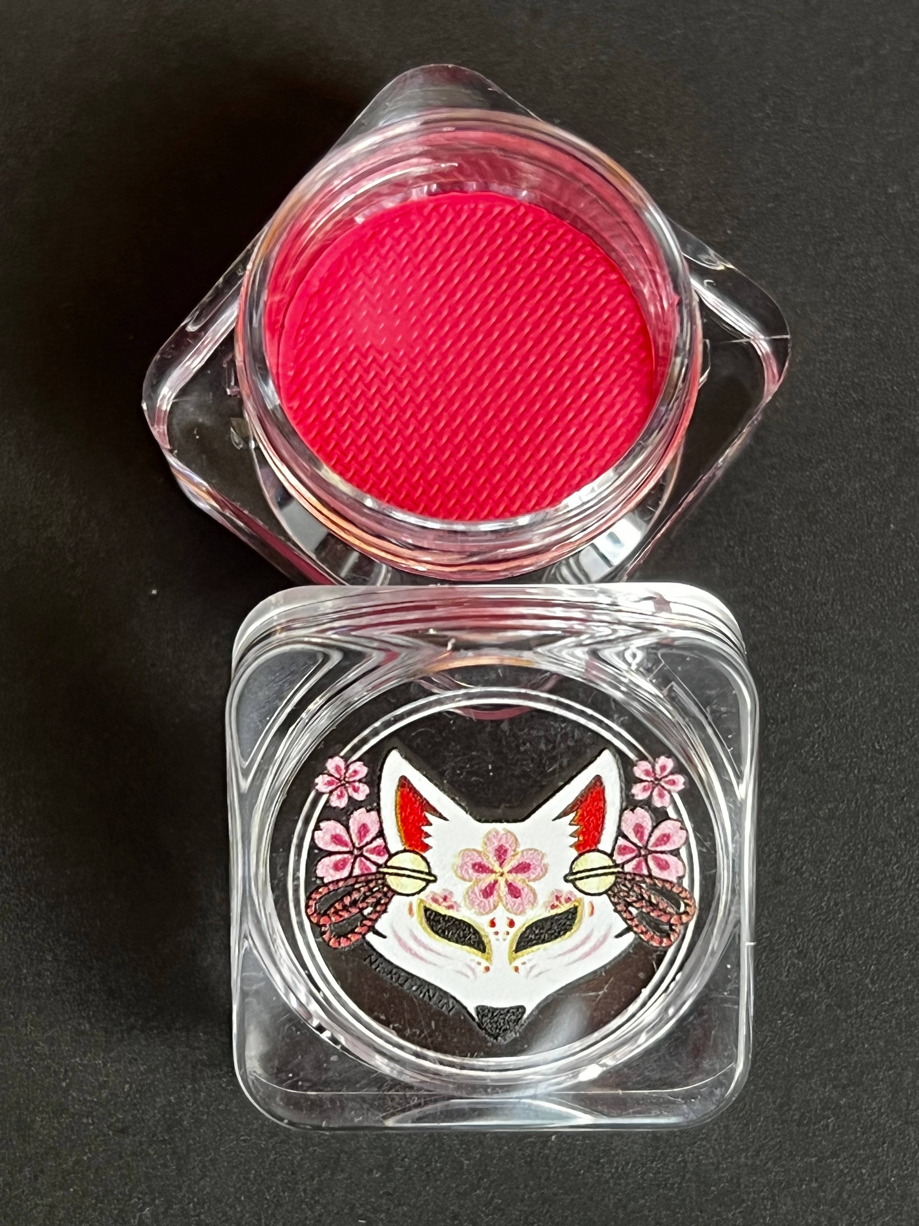 Pink water-activated graphic liner by Nekoyanin, featuring vibrant cerise color and bold, artistic design.