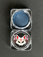 Blue denim water-activated graphic eyeliner by Nekoyanin, showing the vibrant, detailed design on the product container.