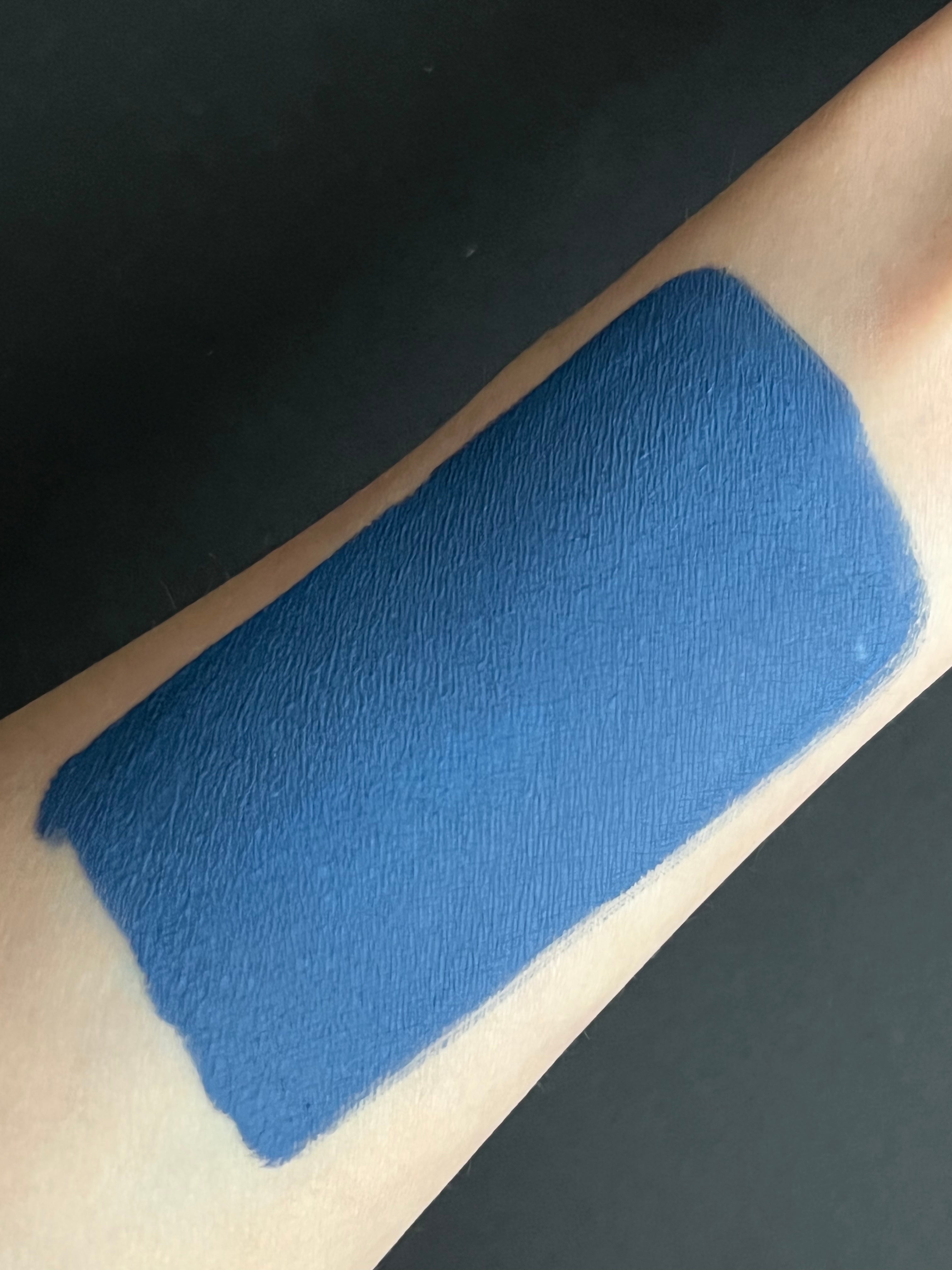 Blue denim Water Activated Graphic Liner by Nekoyanin, showcasing a vibrant, water-activated design on the product.