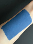 Blue denim Water Activated Graphic Liner by Nekoyanin, showcasing a vibrant, water-activated design on the product.