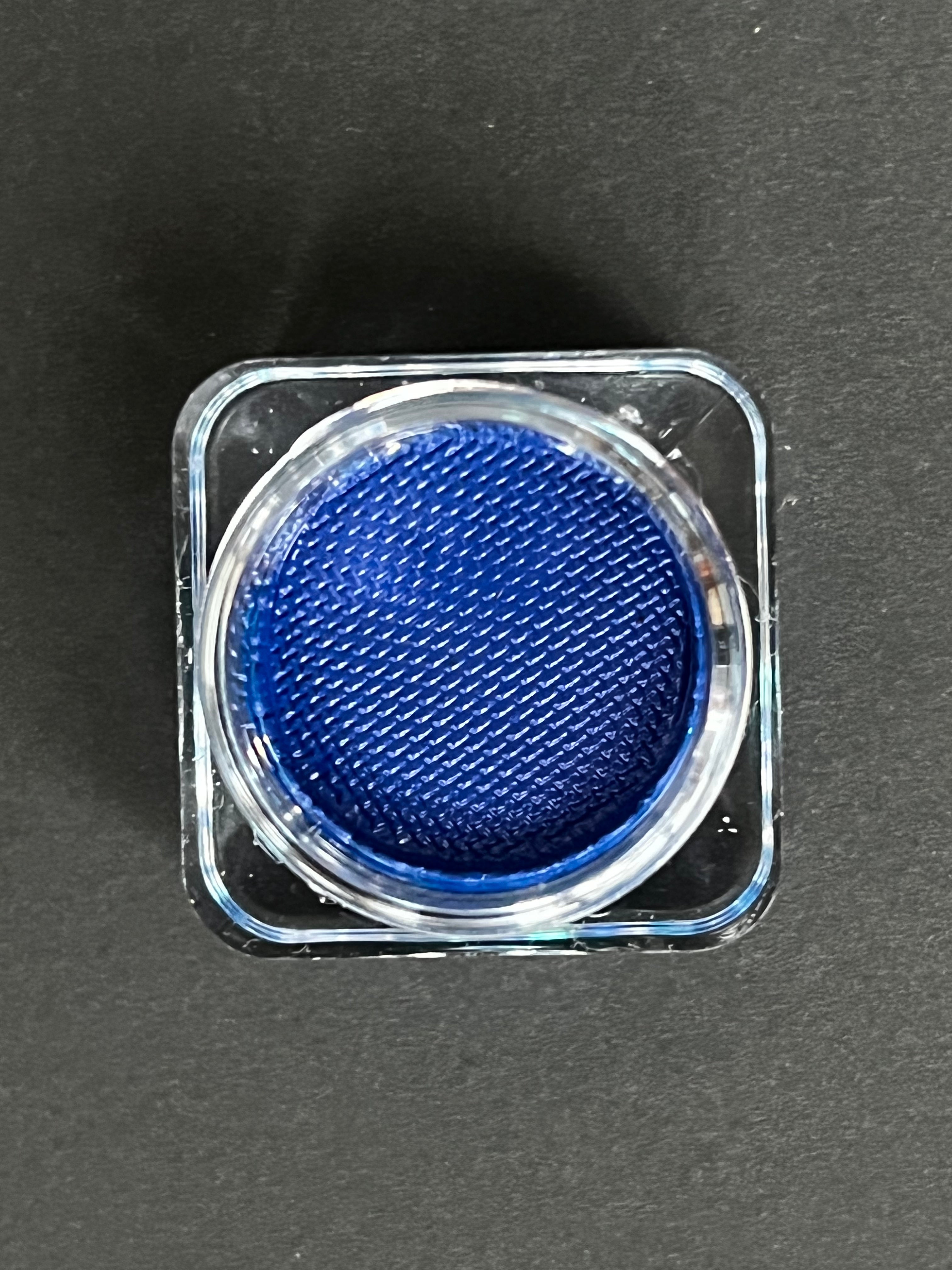 Nekoyanin Navy Water Activated Graphic Liner with vibrant blue design, perfect for bold eye makeup looks.