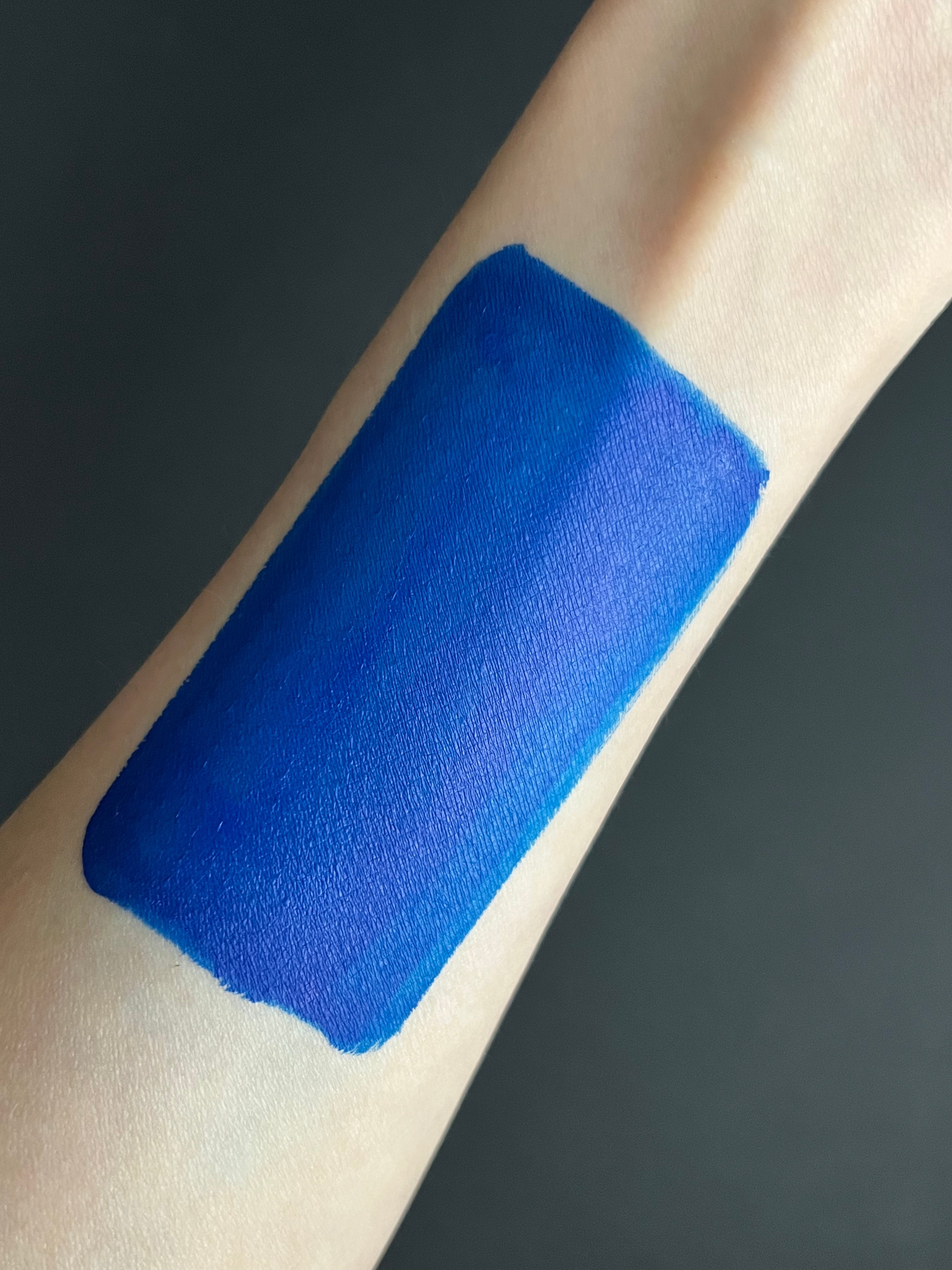 Nekoyanin Navy Water Activated Graphic Liner with sleek blue design, perfect for creating vibrant, artistic eye makeup looks.