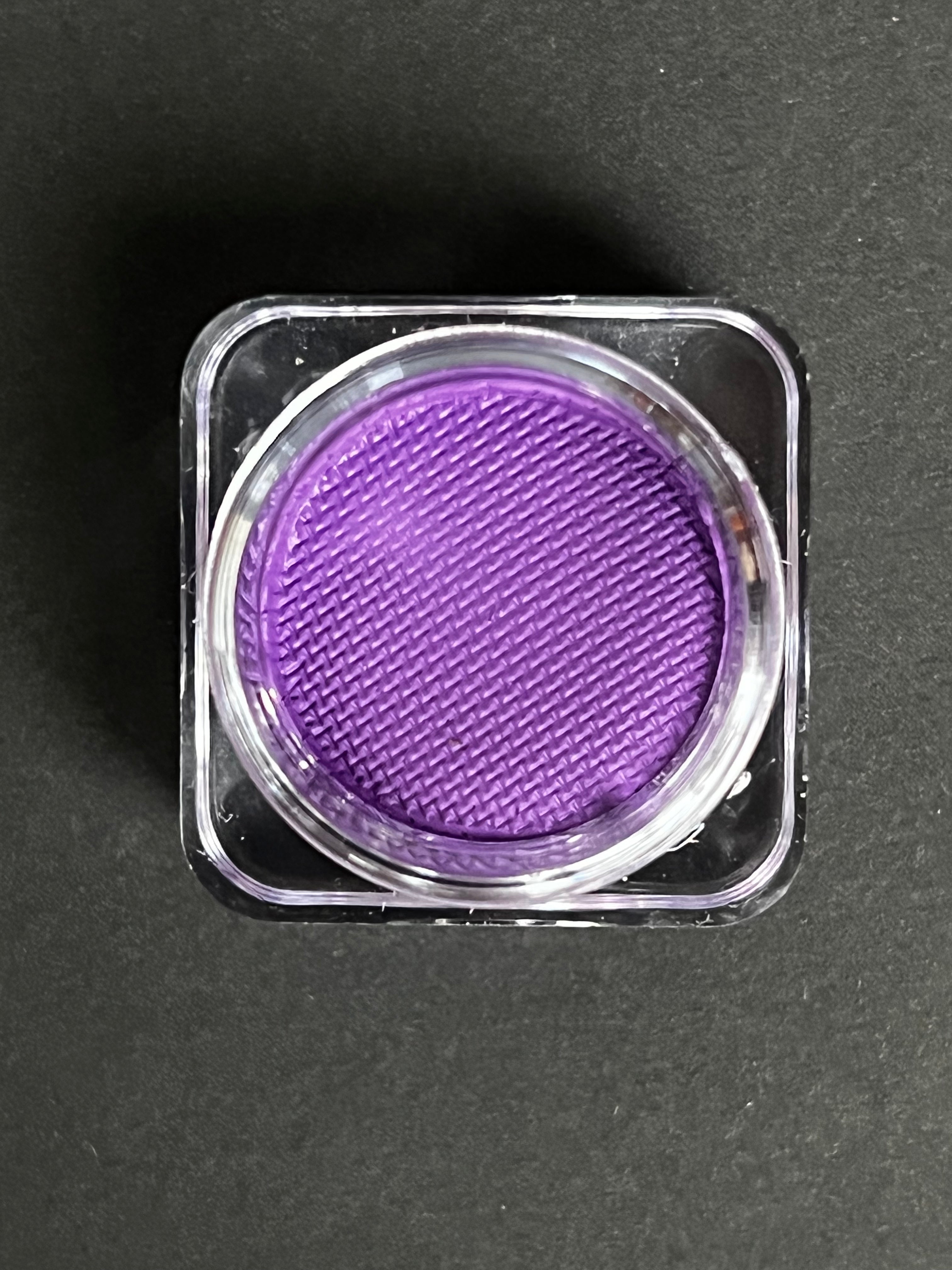 Purple Grape Water Activated Graphic Liner by Nekoyanin, showcasing vibrant, water-activated eyeliner with a bold graphic design.