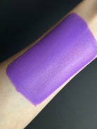 Purple water-activated graphic liner by Nekoyanin, featuring a vibrant grape-colored design for bold eye makeup looks.